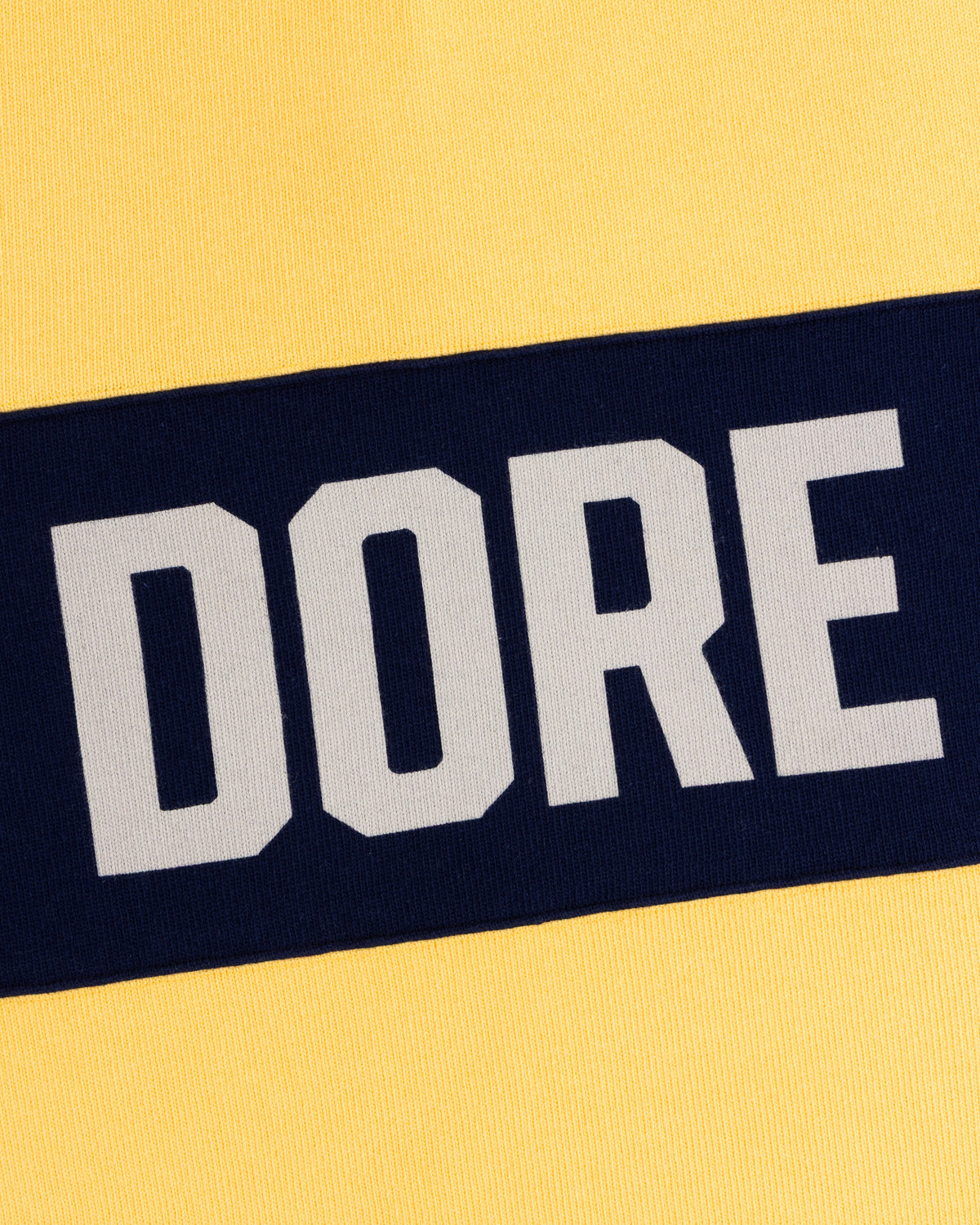 Aimé Leon Dore Exclusive - Leon Dore Collegiate Rugby Cornsilk