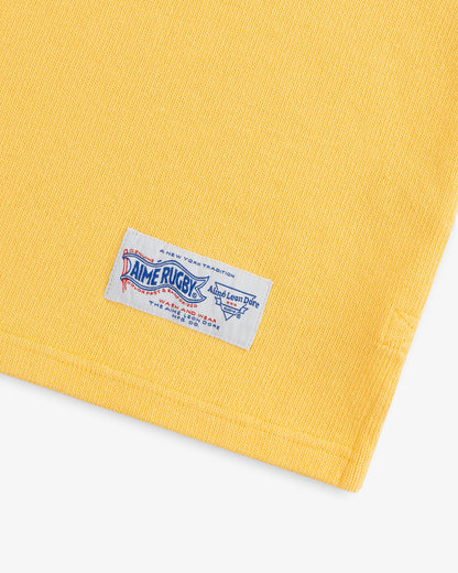 Aimé Leon Dore Exclusive - Leon Dore Collegiate Rugby Cornsilk