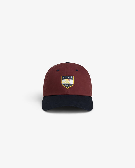 Aimé Leon Dore Recommended - Crest Shield Hat Cordovan / navy blazer